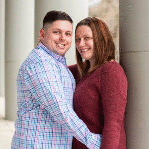 engaged couple smiling